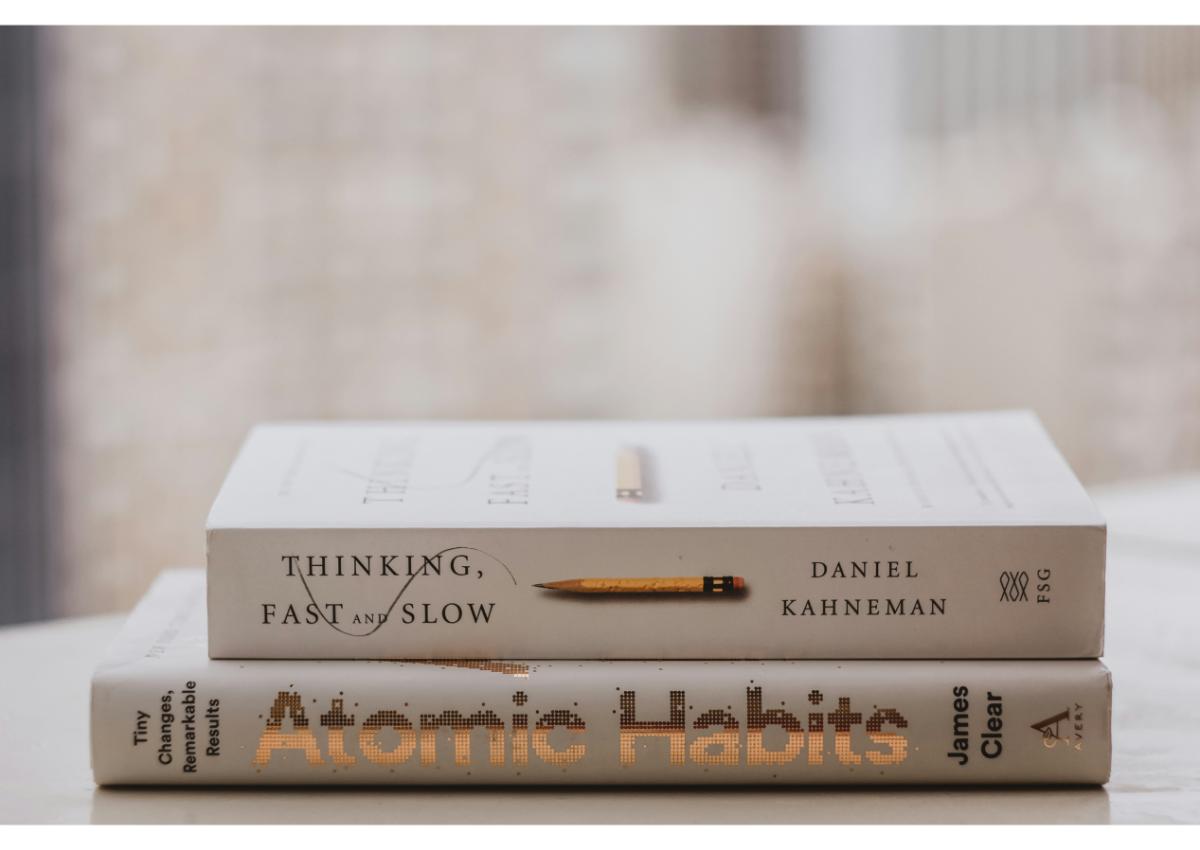 A stack of books symbolising additional resources for career development and personal growth