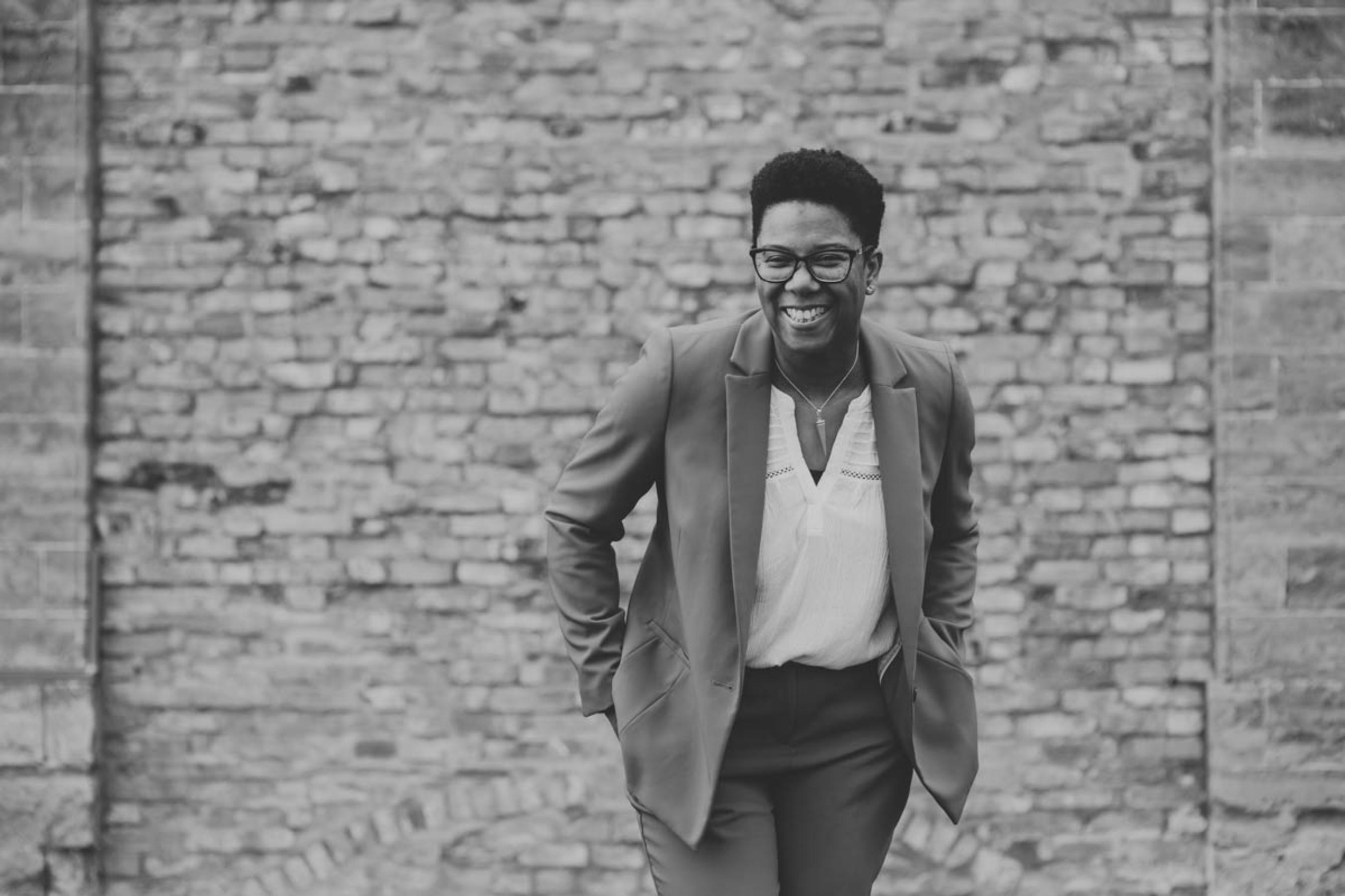 Val Mattinson smiling confidently, inviting readers to explore coaching options and take the next step